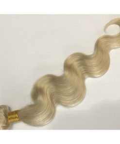 Tissages blond légèrement ondulés Qualité Remy Hair
